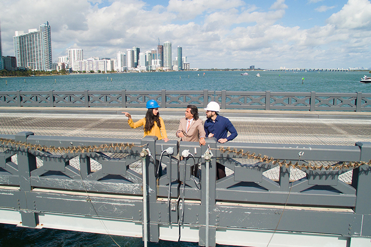 Atorod Azizinamini with two engineers on bridge